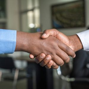 shaking hands with a disability lawyer