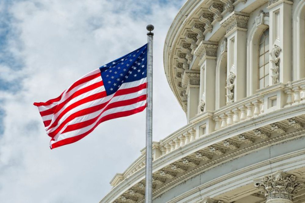 American flag in front of the congress building