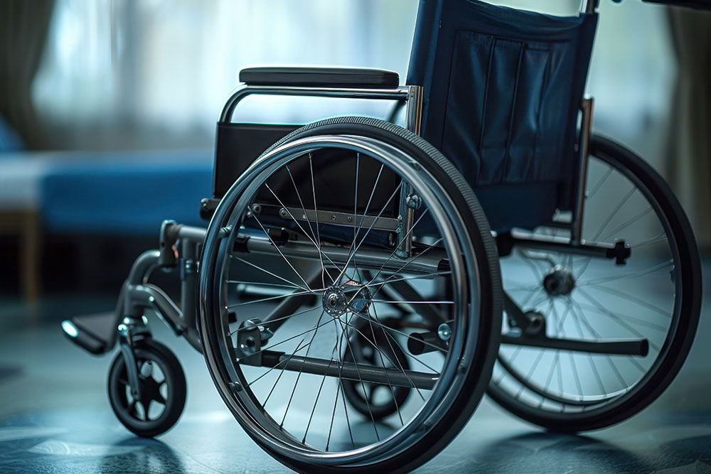 Manual wheelchair in a well-lit room, highlighting accessibility and mobility aids.
