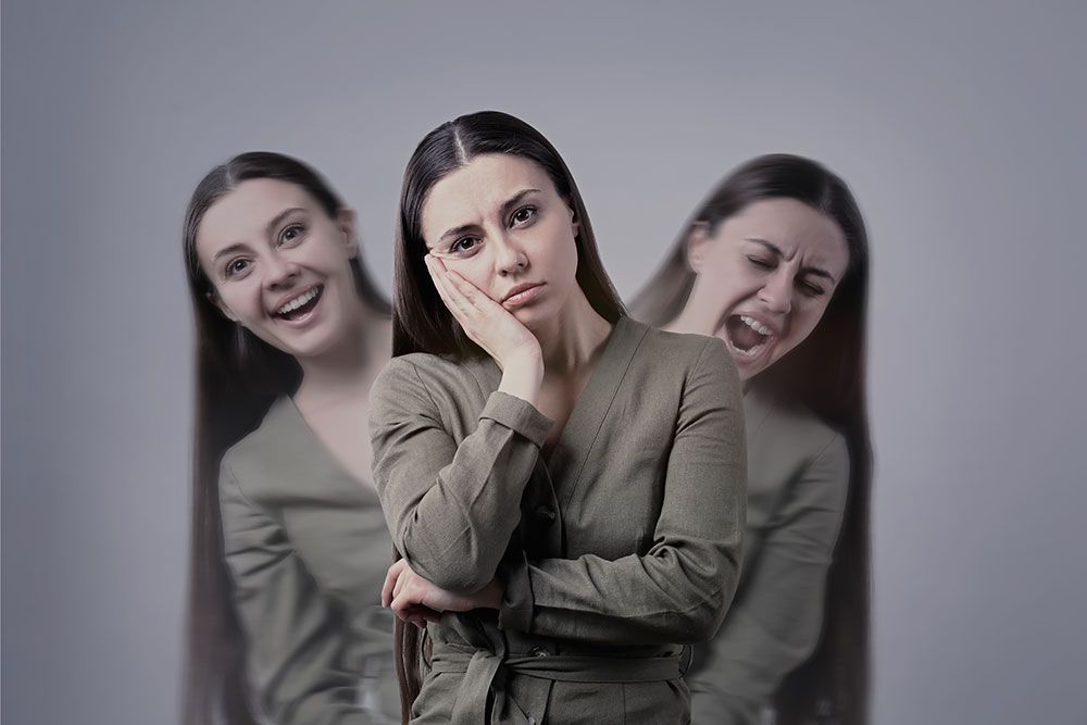 Woman experiencing mixed emotions: happiness, sadness, and anger. Concept of emotional diversity and mood swings.