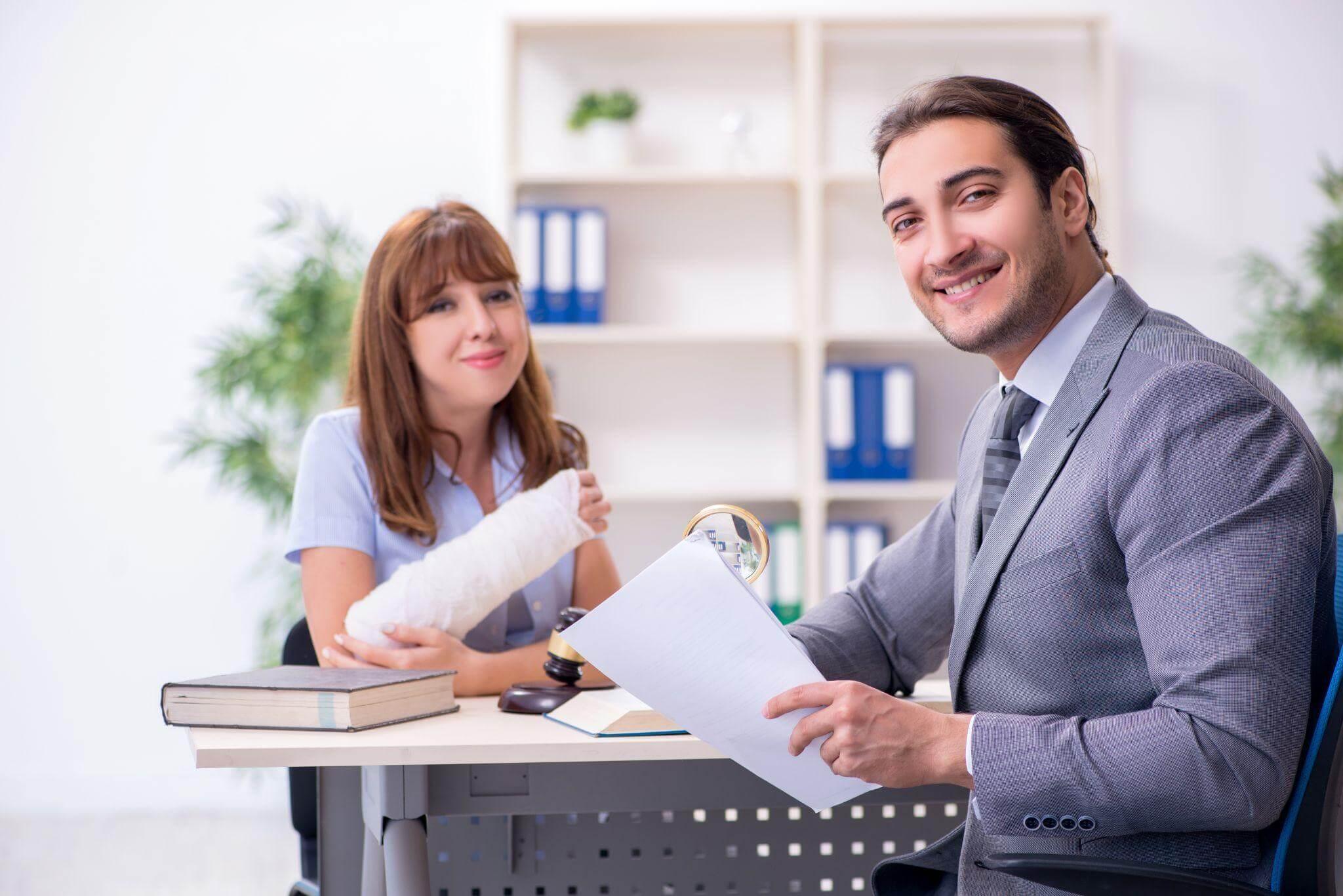 a man and a woman sitting at a desk
