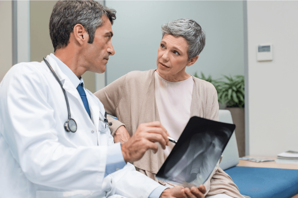 Orthopedic doctor speaking to a patient