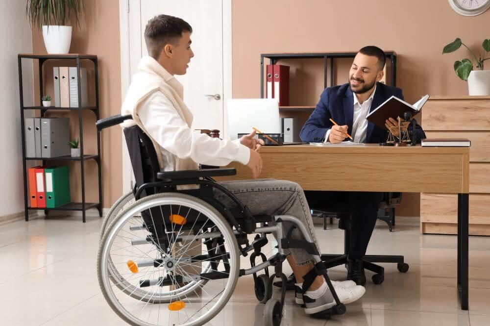 Two men, one in a wheelchair